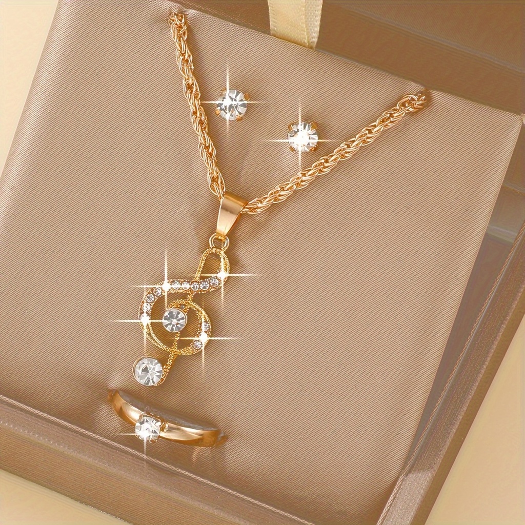 Set de 4 Piezas de Joyería: Collar, Aretes y Anillo con Detalle de Nota Musical