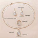 Set de 4 Piezas de Joyería Colgante Ovalada: Collar, Anillo y Pendientes