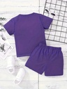 Conjunto de Camiseta y Short con Estampado de Letras y Bloques de Color Luxeira