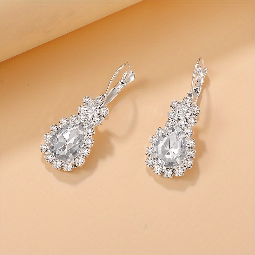 Set de 4 Piezas de Joyería con Forma de Gota de Agua: Collar, Anillo y Pendientes