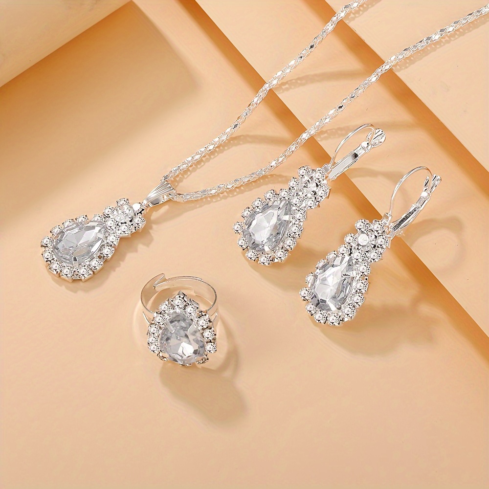 Set de 4 Piezas de Joyería con Forma de Gota de Agua: Collar, Anillo y Pendientes