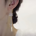 Pendientes Colgantes con Diseño de Copos de Nieve