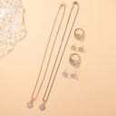Set de 4 Piezas de Joyería: Collar, Pendientes y Anillo con Artesanía de Aleación