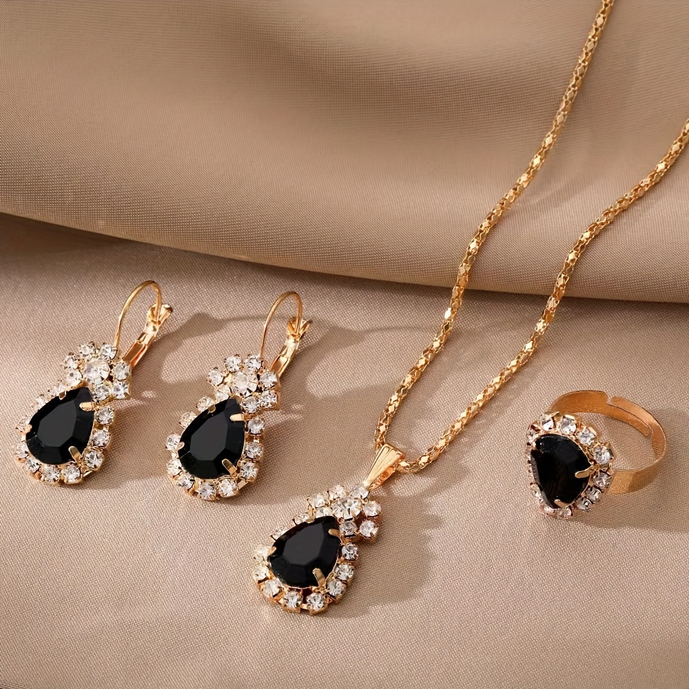 Set de 4 Piezas con Diamantes de Imitación: Collar, Pendientes y Anillo